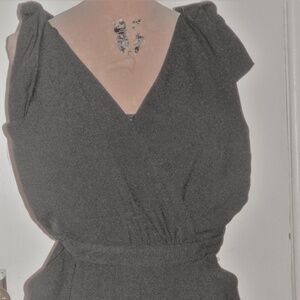 BLACK ROMPER FRONT WRAP V-NECK TO STRAP W BACK LACE AND BACK STRAPS TIED AT TOP
